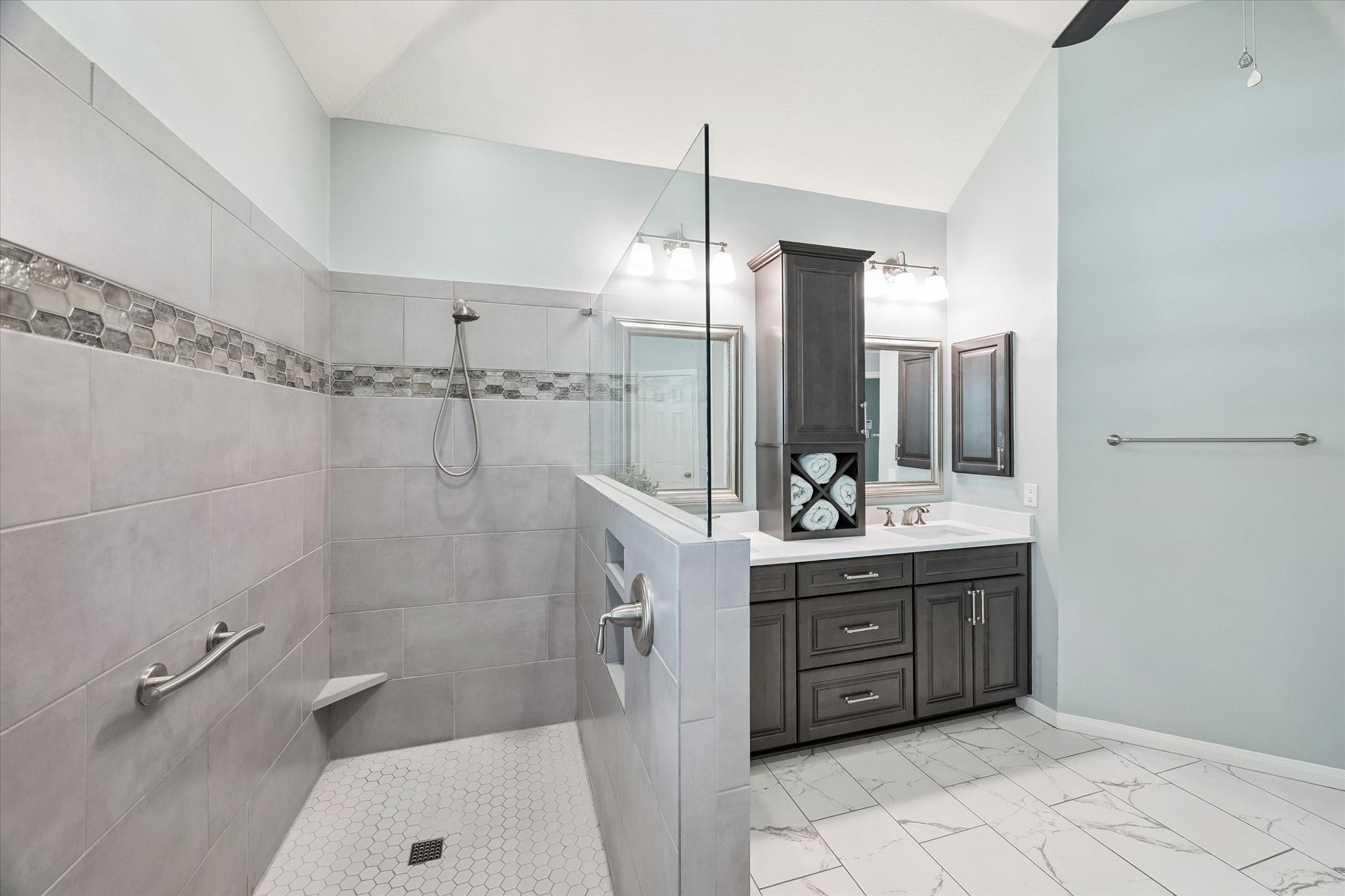 3007 Sycamore Tree Court Houston, TX 77345 - Photo 17 of 24 a bathroom with a tub sink and mirror