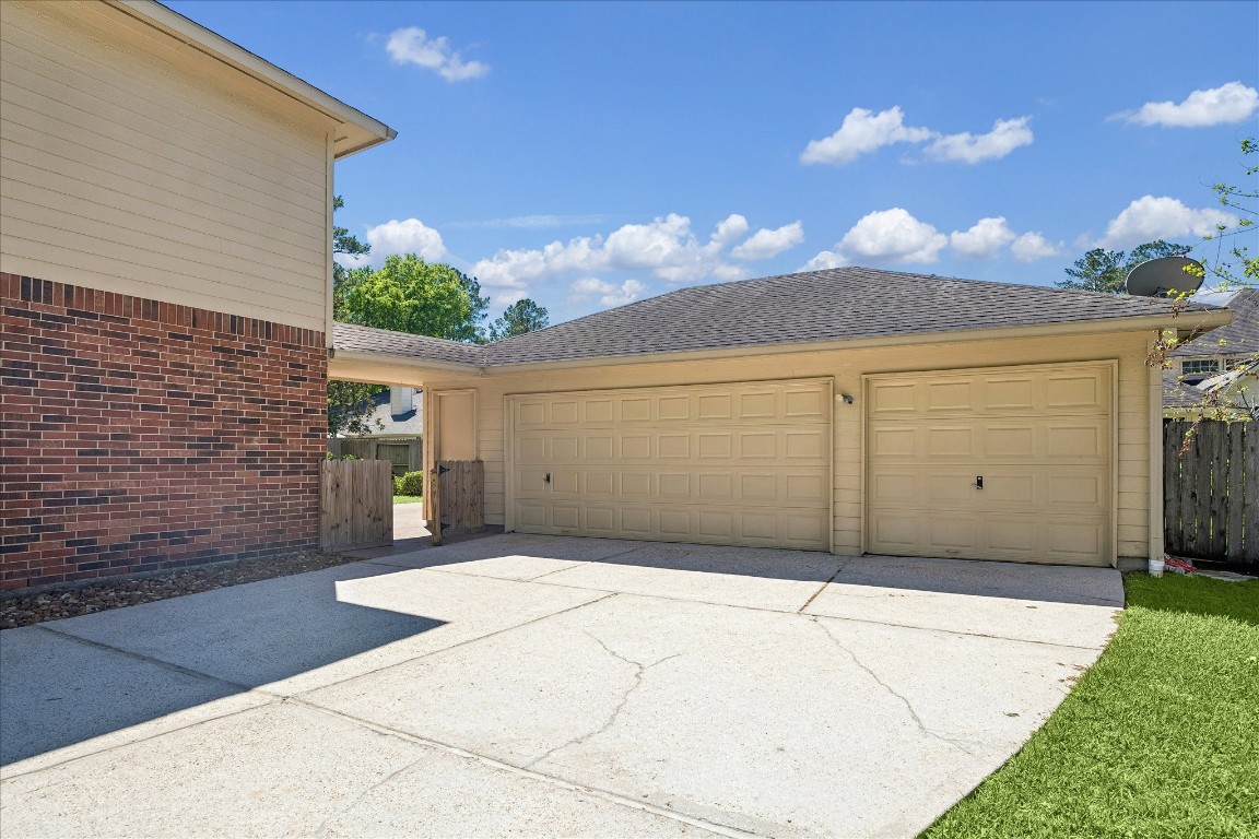 3007 Sycamore Tree Court Houston, TX 77345 - Photo 2 of 24 Extra long driveway and 3 car garage!