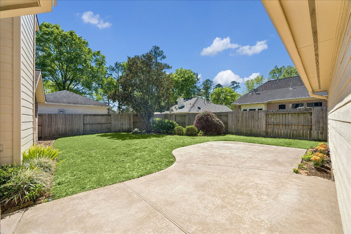 3007 Sycamore Tree Court Houston, TX 77345 - Photo 23 of 24 Extended patio with cool decking