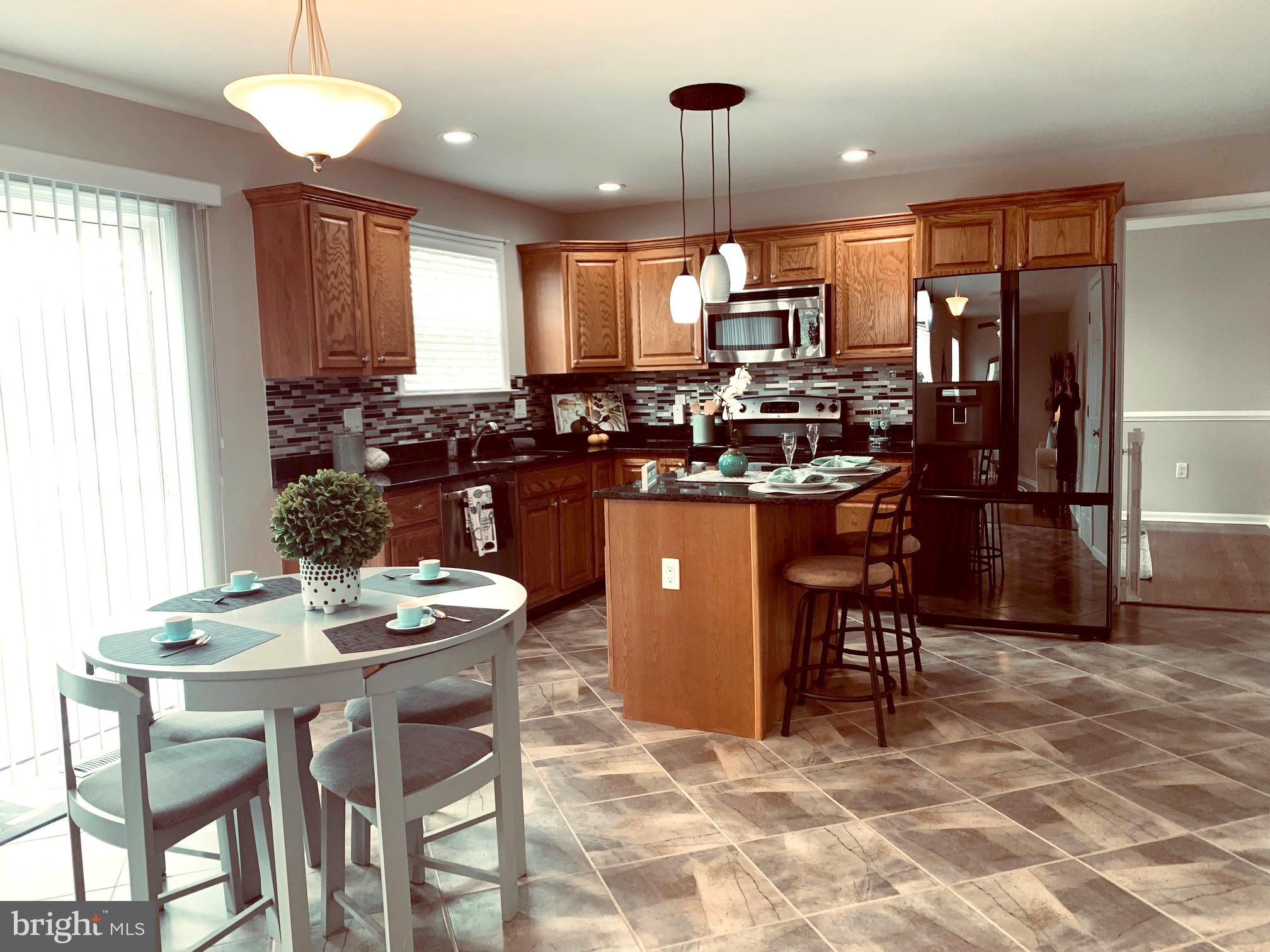 177 Dale Road Pasadena, MD 21122 - Photo 3 of 46 18-inch tile Gourmet Kitchen