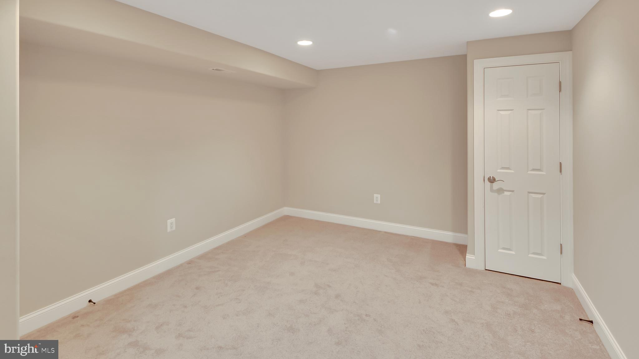 177 Dale Road Pasadena, MD 21122 - Photo 8 of 46 Media room with solid doors for sound suppression
