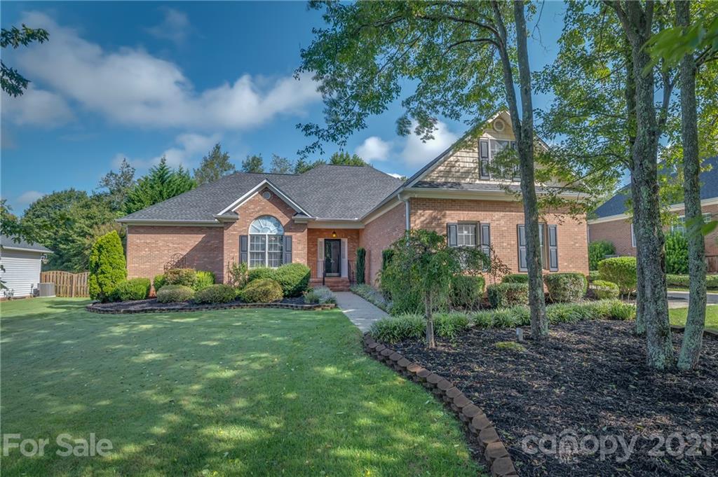 456 Cobblestone Drive Inman, SC 29349 - Photo 1 of 36 a aerial view of a house with a yard and large trees