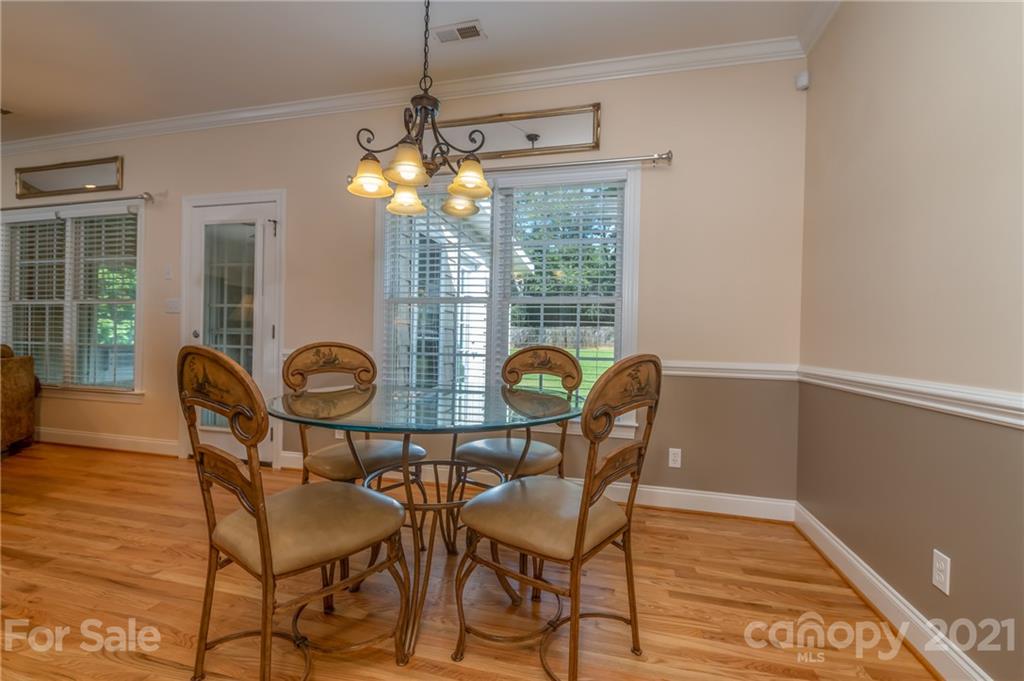 456 Cobblestone Drive Inman, SC 29349 - Photo 14 of 36 a view of a dining room with furniture window and outside view