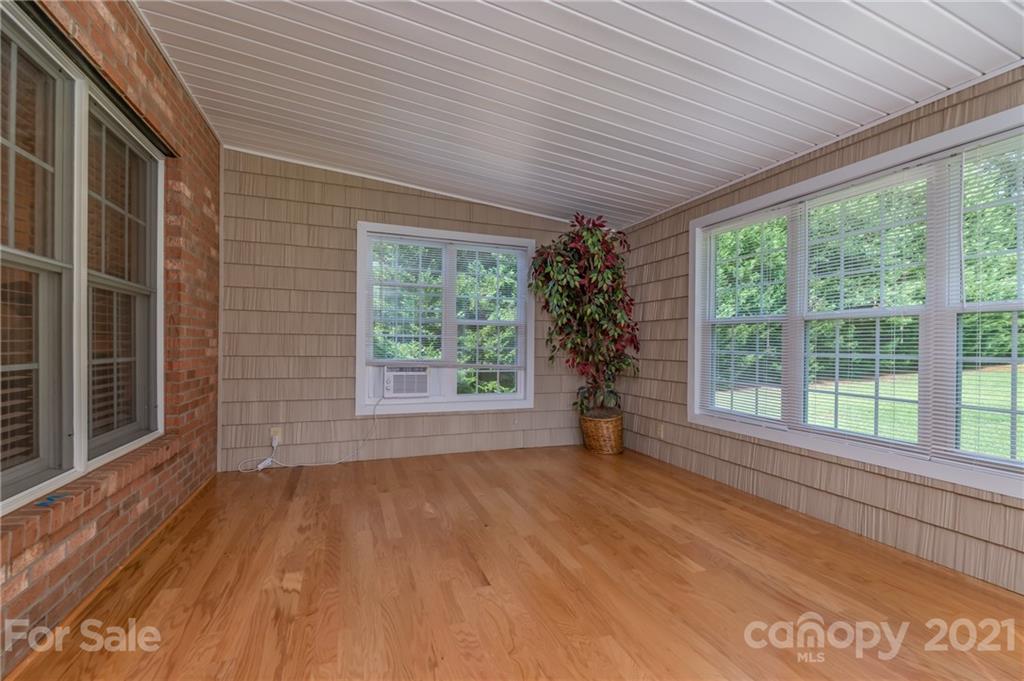 456 Cobblestone Drive Inman, SC 29349 - Photo 16 of 36 a view of empty room with wooden floor and fan