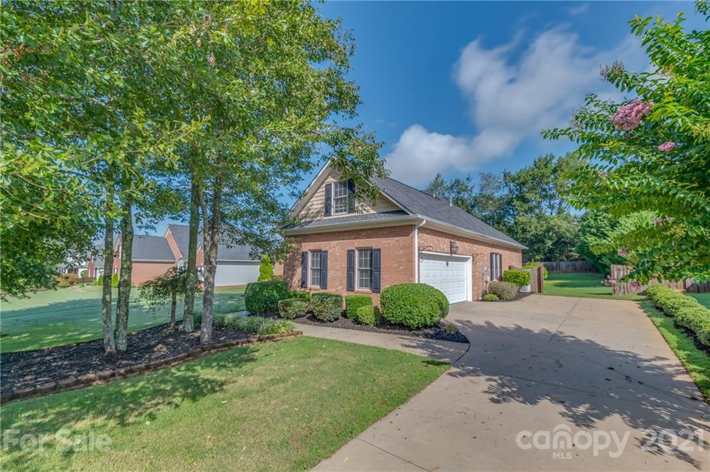 456 Cobblestone Drive Inman, SC 29349 - Photo 3 of 36 a house with trees in the background