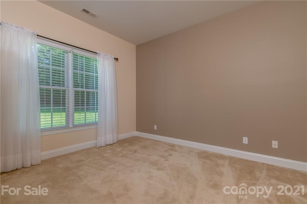 456 Cobblestone Drive Inman, SC 29349 - Photo 27 of 36 a view of an empty room with a window