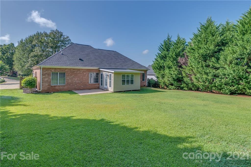 456 Cobblestone Drive Inman, SC 29349 - Photo 35 of 36 a front view of a house with a garden