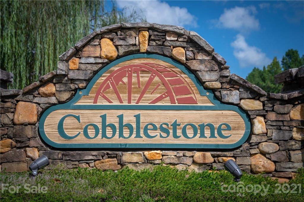 456 Cobblestone Drive Inman, SC 29349 - Photo 36 of 36 a view of a sign board with a wooden fence