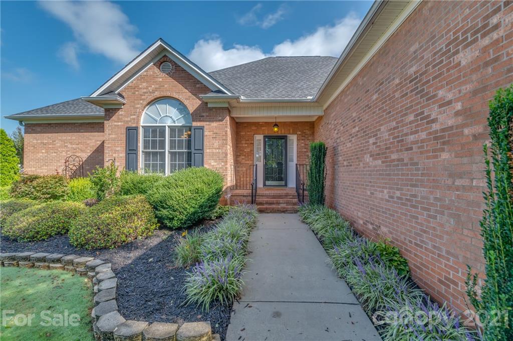 456 Cobblestone Drive Inman, SC 29349 - Photo 5 of 36 a front view of a house with a yard