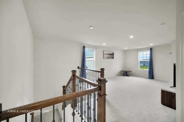a view of a hallway with workspace