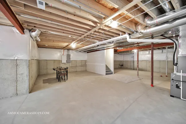 a view of empty room with wooden ceiling