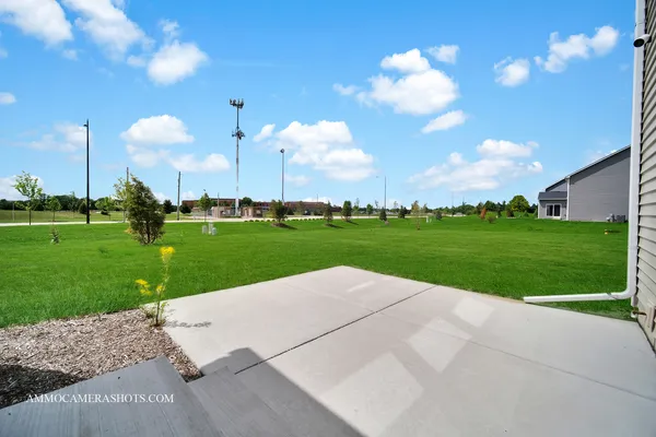 a view of a golf course with a fountain
