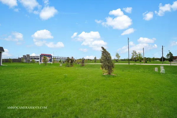 a view of a golf course with a lake