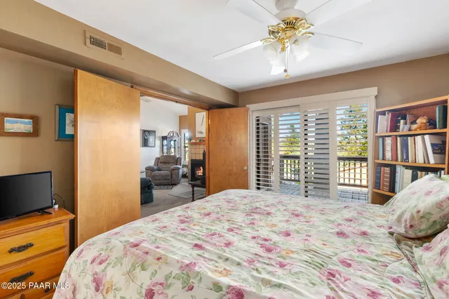 a front view of a house with outdoor seating