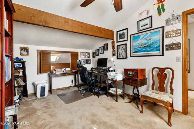 a view of yellow house with a outdoor space