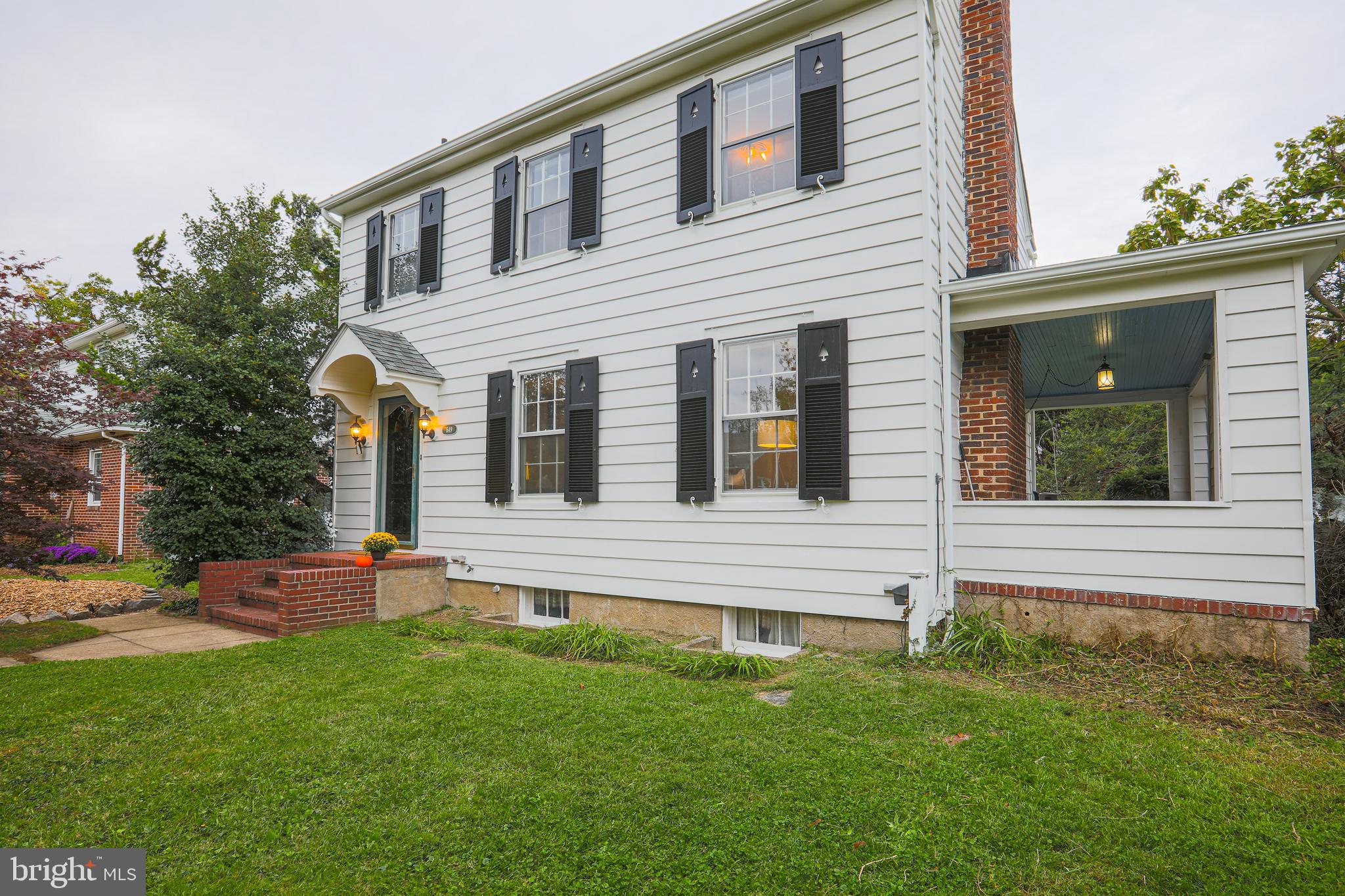 649 Plymouth Road Baltimore, MD 21229 - Photo 3 of 62 Great side porch for additional outdoor space.