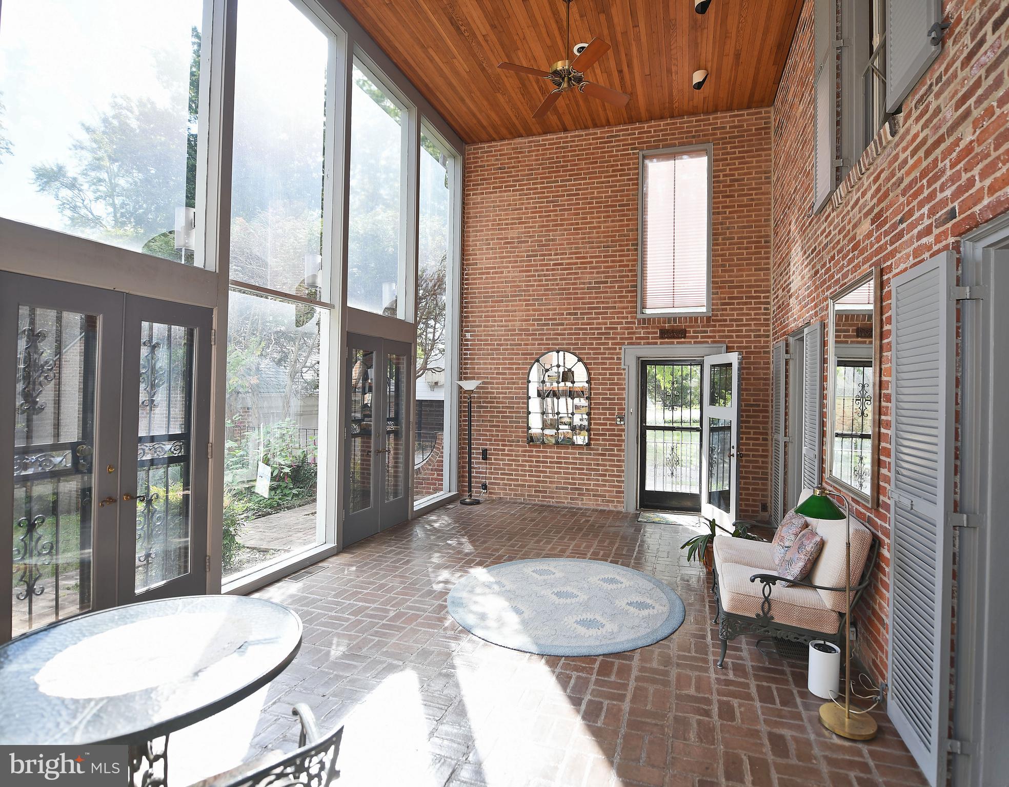 213 Kemble Road Baltimore, MD 21218 - Photo 14 of 66 Dramatic Two Story Sunroom