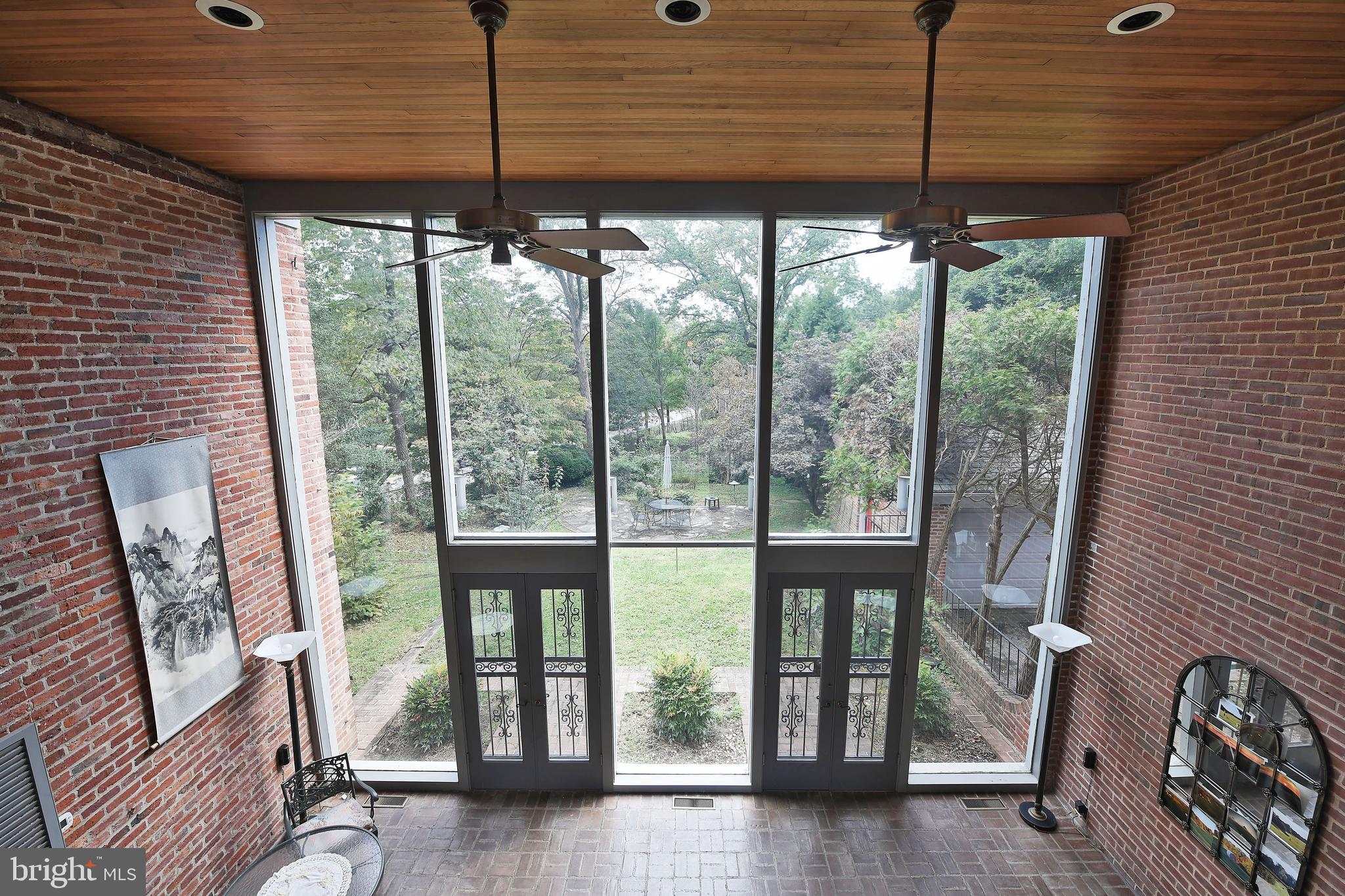 213 Kemble Road Baltimore, MD 21218 - Photo 36 of 66 Owners Suite Sunroom View