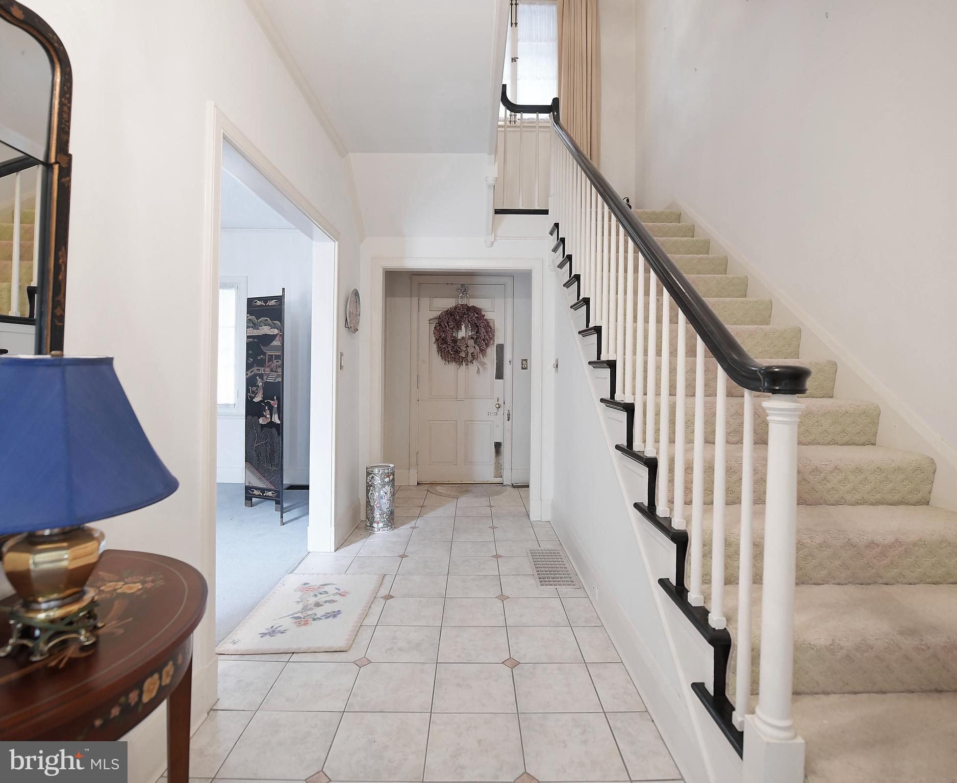 213 Kemble Road Baltimore, MD 21218 - Photo 10 of 66 Foyer Entry and Upper Level Staircase