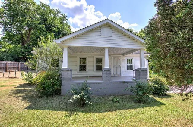 a view of a house with garden
