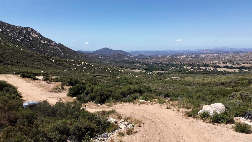 2413-2425 Oak Valley Trail Jamul, CA 91935 - Photo 23 of 40 a view of a lake with a mountain