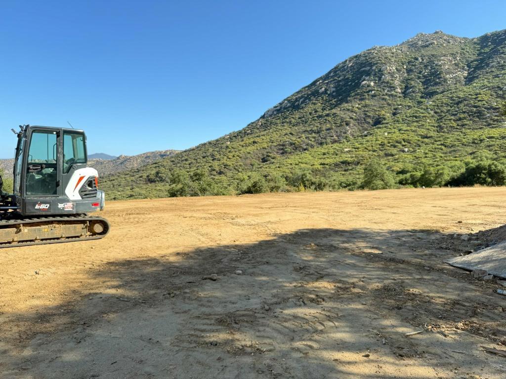 2413-2425 Oak Valley Trail Jamul, CA 91935 - Photo 24 of 40 a view of a swimming pool with a yard