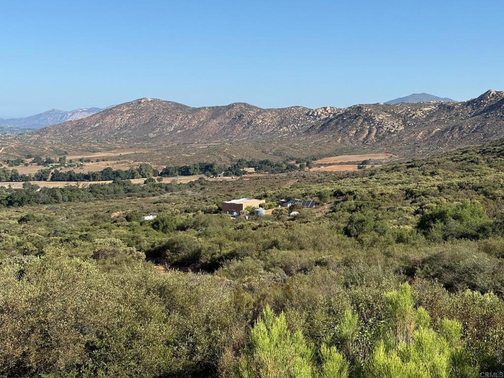 2413-2425 Oak Valley Trail Jamul, CA 91935 - Photo 28 of 40 a view of a mountain in the distance