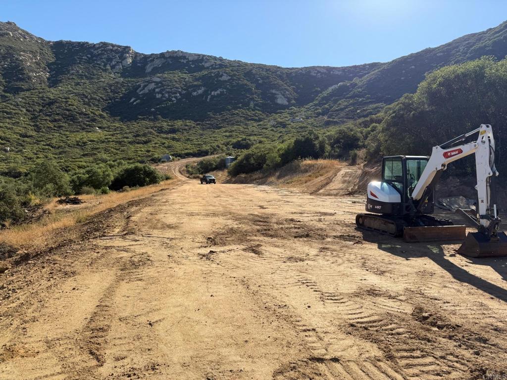 2413-2425 Oak Valley Trail Jamul, CA 91935 - Photo 35 of 40 a view of a backyard of a house