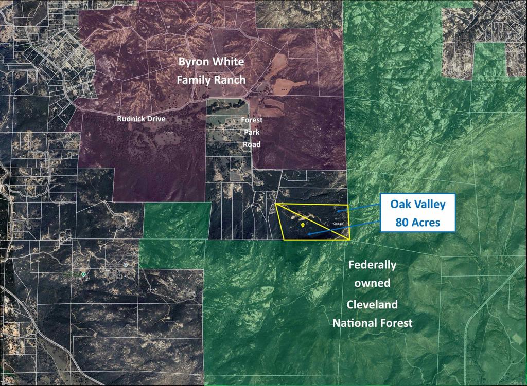 2413-2425 Oak Valley Trail Jamul, CA 91935 - Photo 4 of 40 a sign that is on a brick wall