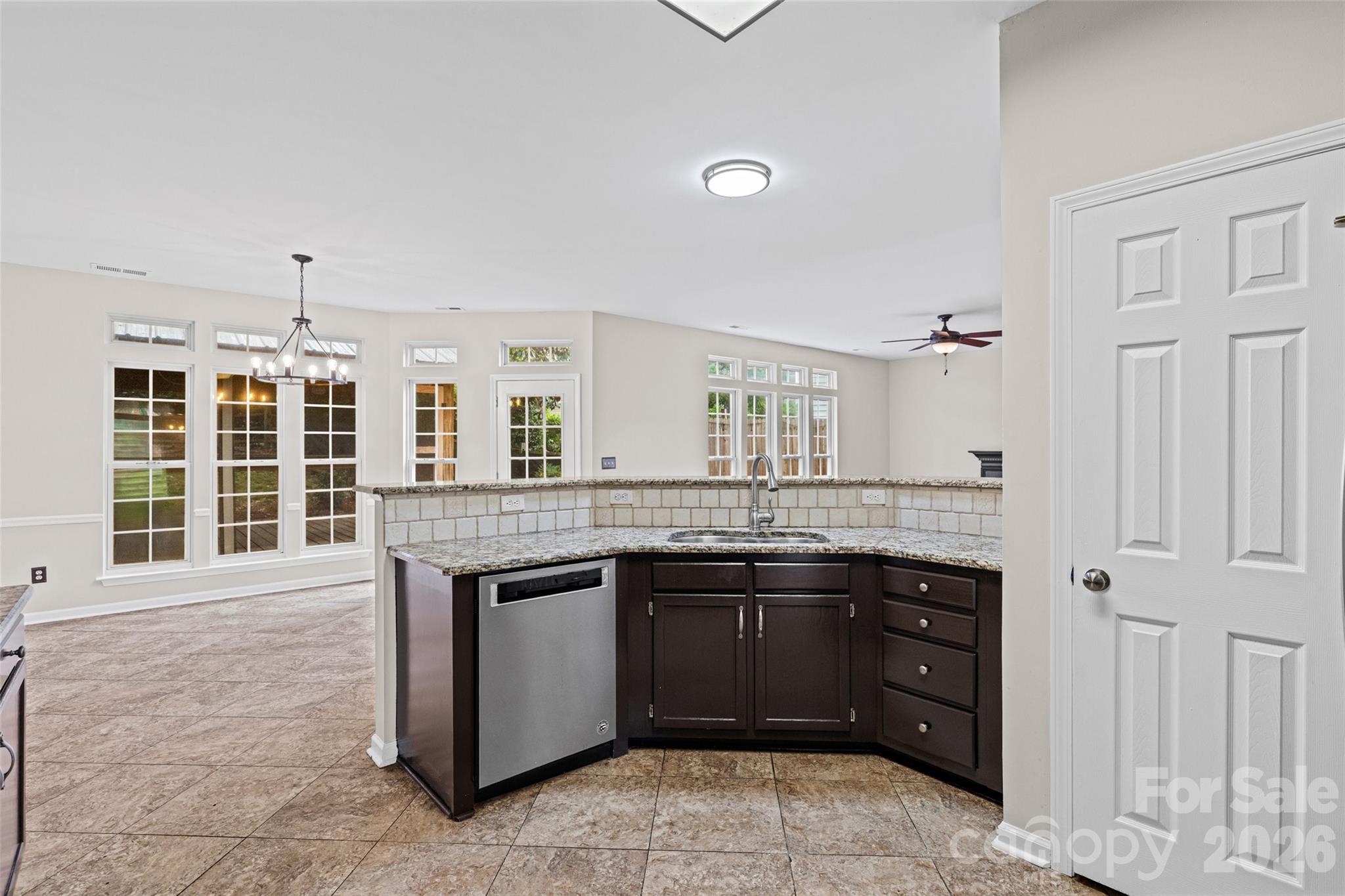 620 East Cheval Drive Fort Mill, SC 29708 - Photo 16 of 48 a spacious bathroom with a granite countertop sink and a mirror