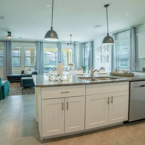 $699,000 | 7868 Oak Reflection Loop, Davenport, FL 33837