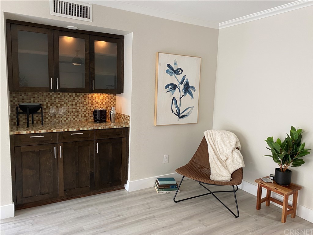 9960 Owensmouth Avenue, Unit 25 Chatsworth, CA 91311 - Photo 5 of 17 a living room with furniture