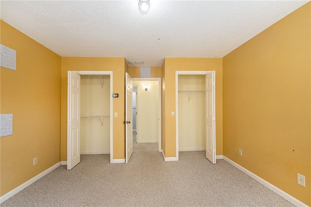 7929 Pea Ridge Road Lula, GA 30554 - Photo 27 of 35 a view of an empty room with closet and a window