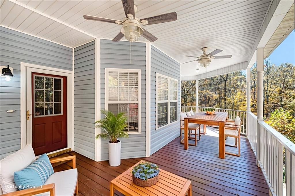 7929 Pea Ridge Road Lula, GA 30554 - Photo 4 of 35 a living room with furniture and wooden floor