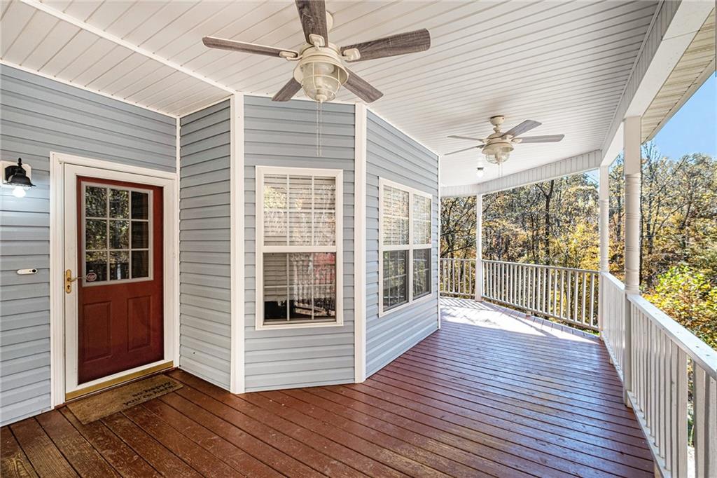 7929 Pea Ridge Road Lula, GA 30554 - Photo 5 of 35 a view of a livingroom with wooden floor