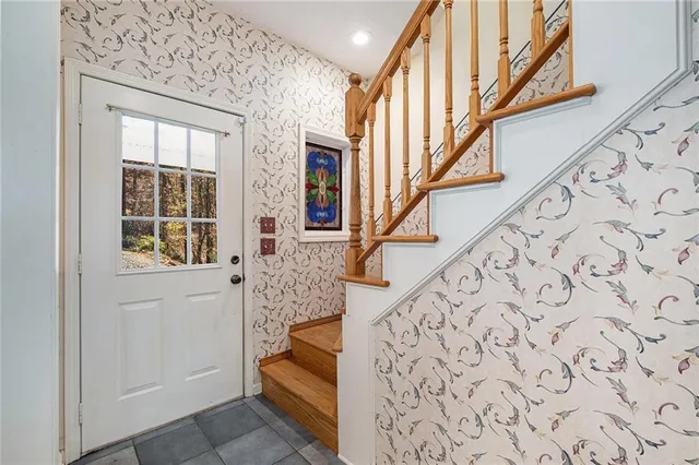 wooden floor with an entryway