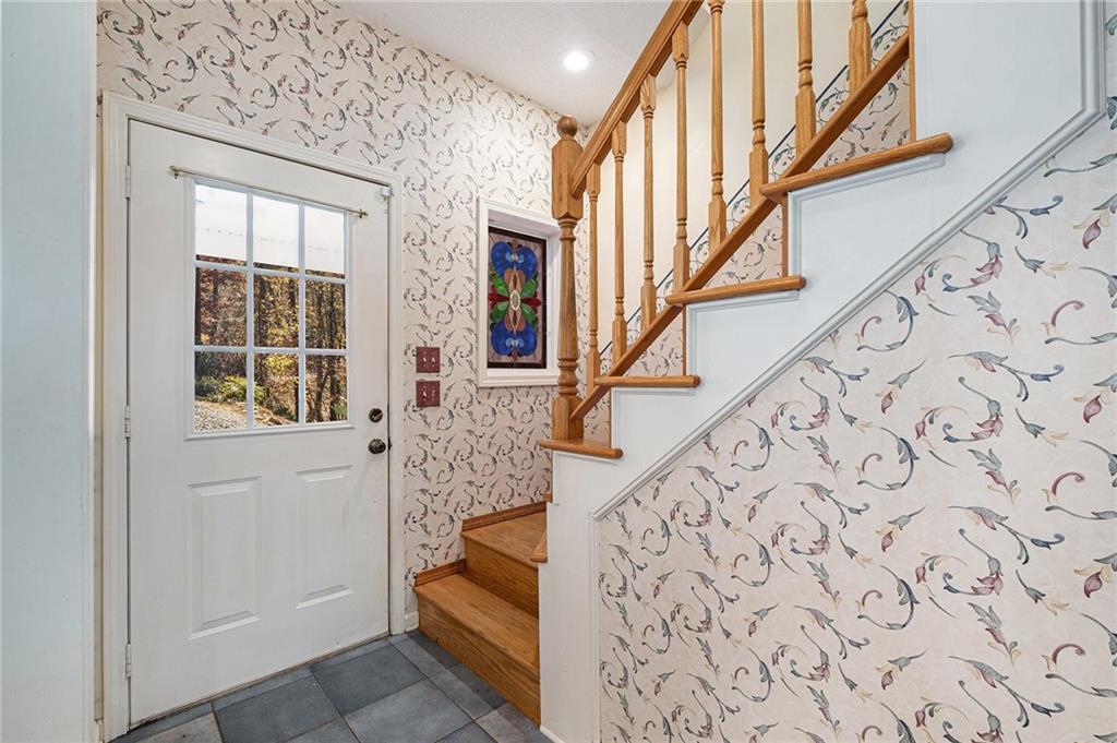 7929 Pea Ridge Road Lula, GA 30554 - Photo 7 of 35 wooden floor with an entryway