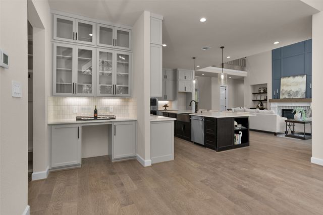 a kitchen with counter top space and appliances