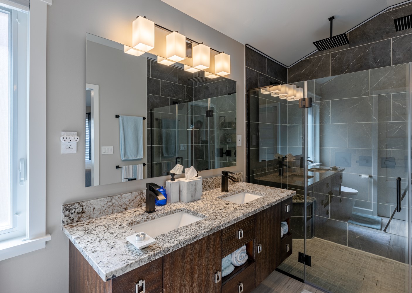 5208 Petty Street, Unit D Houston, TX 77007 - Photo 29 of 39 a bathroom with a granite countertop sink and a mirror