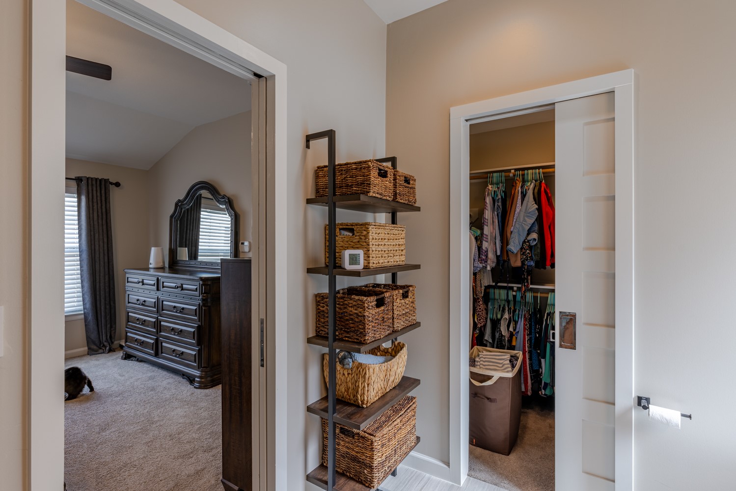 5208 Petty Street, Unit D Houston, TX 77007 - Photo 30 of 39 a view of walk in closet with clothes and shoes