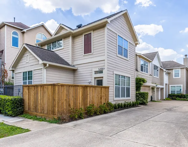 a view of a house with a garden