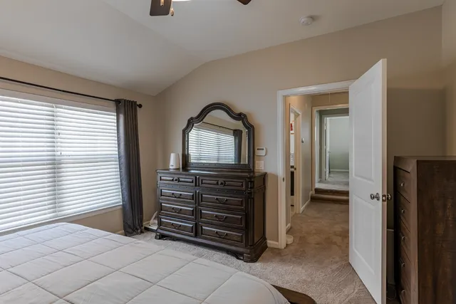 a view of room with closet and a window