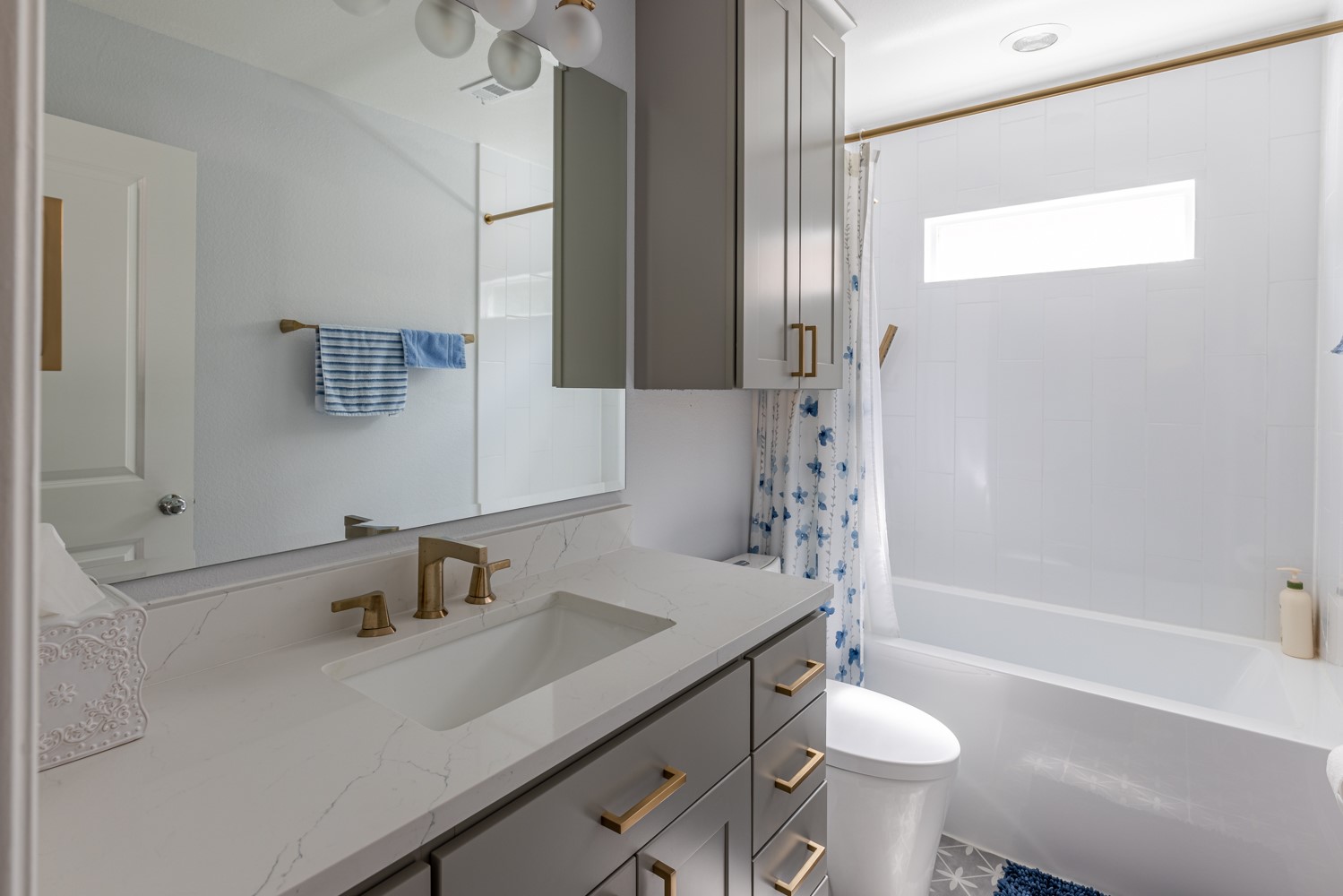 5208 Petty Street, Unit D Houston, TX 77007 - Photo 34 of 39 a bathroom with a sink toilet a mirror and shower