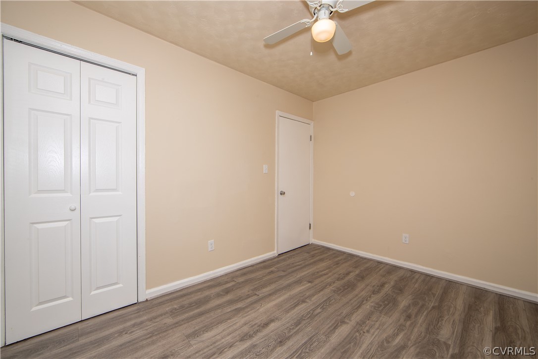 12207 Baltimore Road Ford, VA 23850 - Photo 18 of 24 wooden floor in an empty room