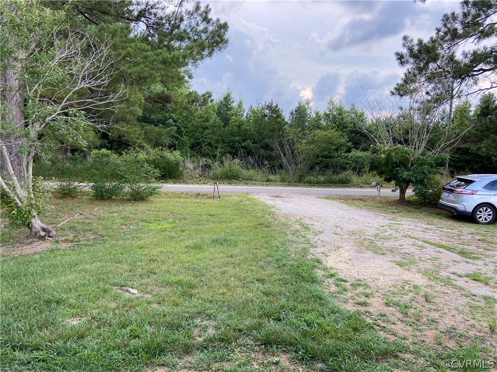 12207 Baltimore Road Ford, VA 23850 - Photo 22 of 24 a car parked in the middle of a field