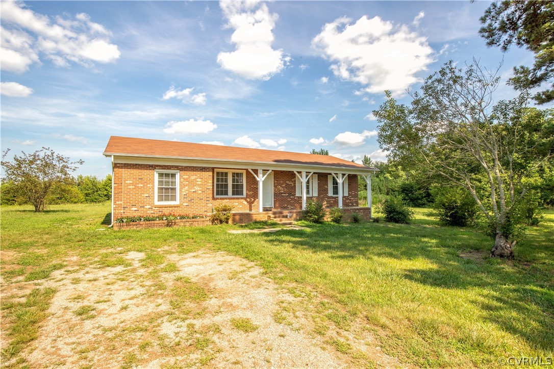 12207 Baltimore Road Ford, VA 23850 - Photo 24 of 24 a view of a house with a yard