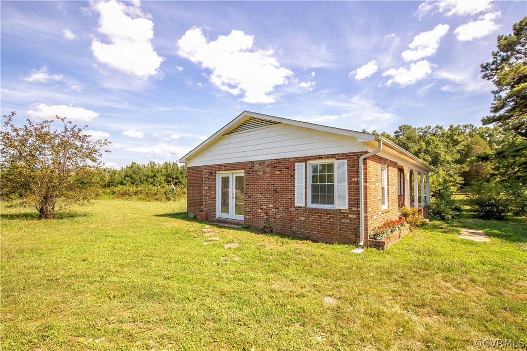 12207 Baltimore Road Ford, VA 23850 - Photo 3 of 24 a view of a house with a yard