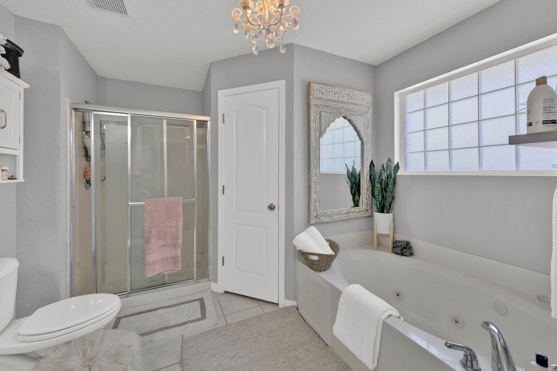 552 East Shipwreck Road Santa Rosa Beach, FL 32459 - Photo 23 of 38 a bathroom with a sink a toilet and shower