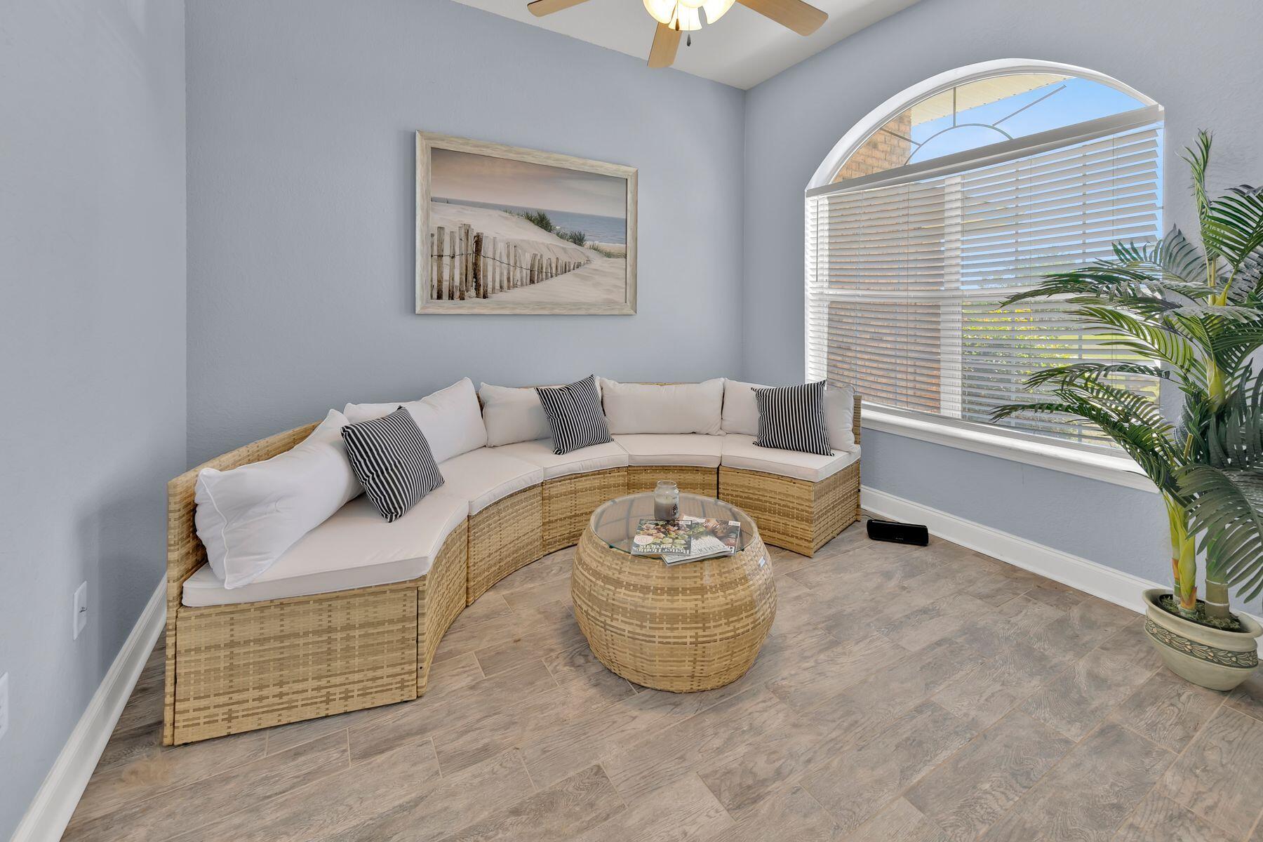 552 East Shipwreck Road Santa Rosa Beach, FL 32459 - Photo 6 of 38 a living room with furniture and a window