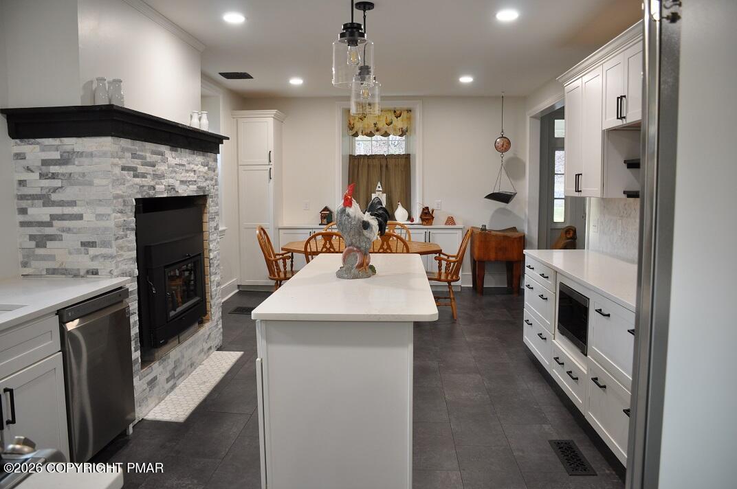1642 Kunkletown Road Saylorsburg, PA 18353 - Photo 4 of 27 Kitchen with FP and island toward dining